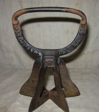 A Early Three Blade Metal Food Chopper